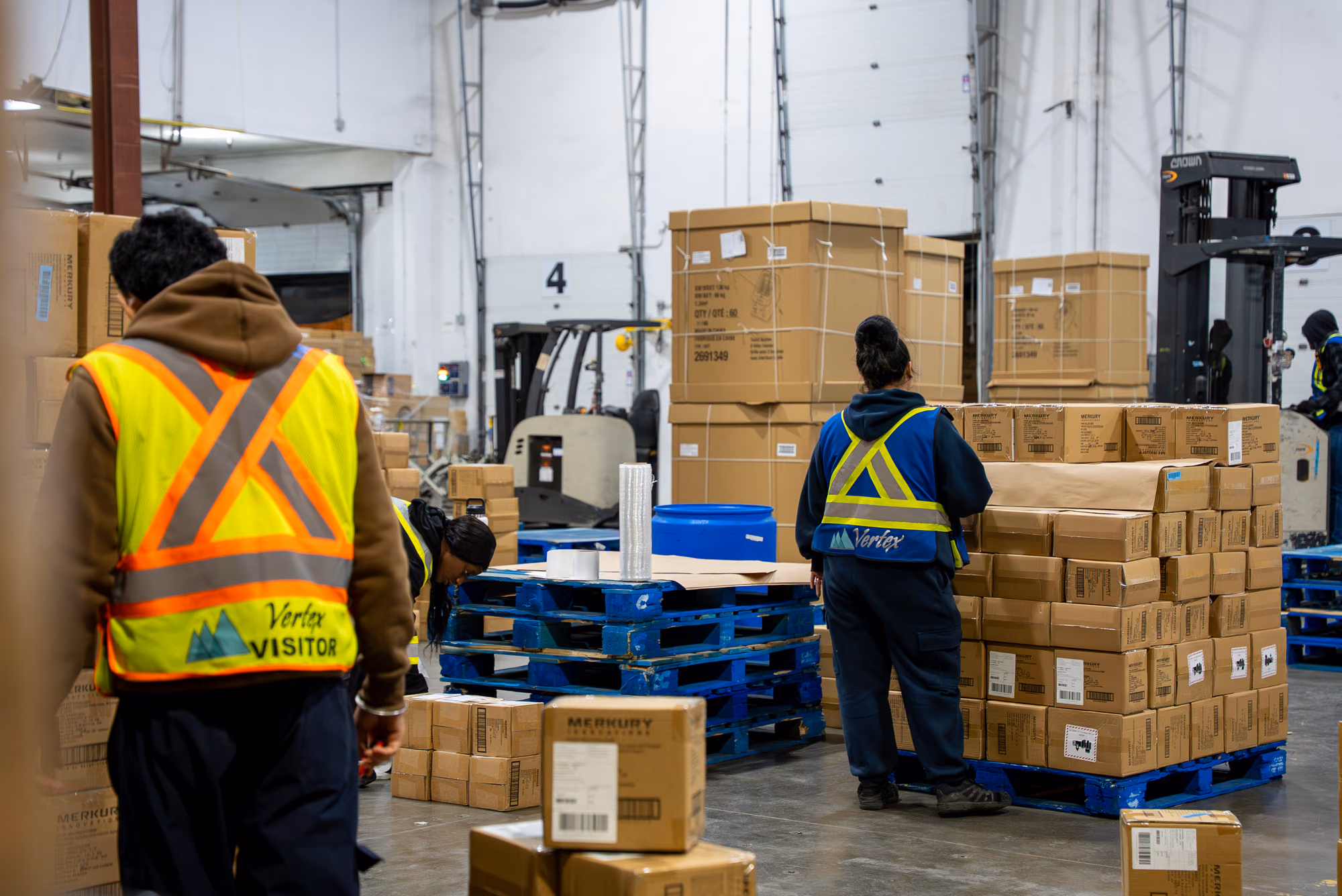 Vertex associates staging pallets in the warehouse ahead of peak season